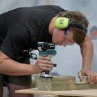 Overall winner Roy Devereux carefully trims an edge during the Otago edition of the New Zealand...