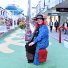 Cr Mandy Mayhem tests the playground equipment installed as part of the George St upgrade. Photo:...