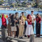 Tōrua performers take a bow after finishing their first show. From left: Xin Ji, Andre Quinlan...