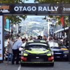 Dunedin Mayor Jules Radich views the rally cars on show in the Octagon before the Otago Rally...
