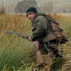 After watching from his ute for a while and listening for other shooters, Milton Newcomer Wayne...