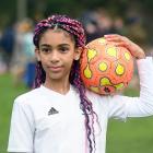 Cecilia McLaughlin, 9, gets ready for her next match at the Green Island junior seven-a-side...