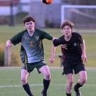 Taylor Brown, of Bayfield High School, and Kahu Edmond-Smaill, of Logan Park High School, compete...