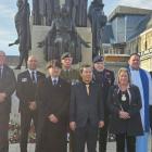 Participants pose for a group photo after the Korean War Veterans Commemoration Ceremony held in...
