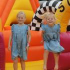 Hazel, 7, and Olive Steel, 4, have fun on an inflatable activity. PHOTOS: GERRIT DOPPENBERG

