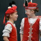Iaera Abrahamson (left) and Grace le Grelle share a joke as they wait to compete.

