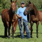 Jonathan Gabler, developer of Queenstown’s polo facility,  with two of the horses he and his wife...