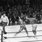 Muhammad Ali lands a left hook against Joe Frazier in their first fight in 1971. Photo: Reuters