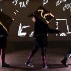 . Rehearsing for the performance at the Underground Market is val smith (right) and fellow...