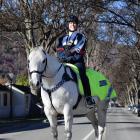 Sergeant Kate Pirovano, of Queenstown, on her horse, Slide, yesterday afternoon in Arrowtown...
