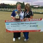 Dunedin’s Carolyn Crawford (left) holds the winner’s cheque with runner-up Pam Walker, of Lauder,...