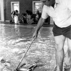 Laing training a swiiming pupil at Moana Pool in the 1970s. Photo by ODT.