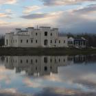 Reflected in its moat, Dot and Neil Smith’s 'castle' at the Riverstone complex is on the cusp of...