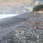 Heavy swells in June have undermined the beach at Oamaru's waterfront. Photo by Hamish MacLean.