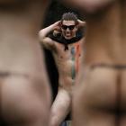 A naked rugby player of the Romanian Vampires performs a Haka. REUTERS/Stefan Wermuth