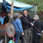 2degrees corporate affairs director Matthew Bollard (centre) talks to (from left) Dunedin South...