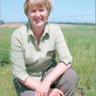 Doing the ‘‘cockie crouch’’ over here: Australian-born Susie McKeague looks over an irrigated...