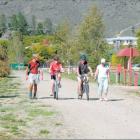 Enjoying the surroundings: Travelling along the newly beautified section of rail trail are...