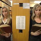 Identical twins Alexandra (left) and Sara Isherwood (23), who will practise law with different...