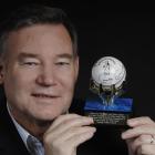 Sport Otago chief executive John Brimble holds the cricket ball used when the State Otago Volts...