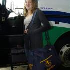 University of Otago student Greta Knarston boards a bus to Christchurch at the Inter-City bus...