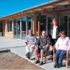 More space: Living Options’ members outside their new premises in Alexandra are (from left)...