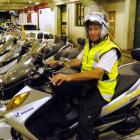 Parking officer Brian Benson, back at work yesterday after his scooter was let loose in Albany...