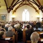 Presbyterian minister the Rev John Sinclair preaches to a packed Pukehiki Church on the Otago...