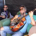 Solo musician Tiki Tane and Little Bushman's Warren Maxwell (right) relax backstage at Rippon...