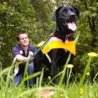 Search Dogs Otago operational search dog handler Richard Warrington (23) with Lucy, who is one of...