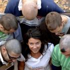 Student Shave-Off organiser Hannah Howard surrounded by five of the 400 University of Otago...