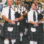 The skirl of the pipes: Alex Joyce, of Alexandra, and Beth Black, of Cromwell, lead the Alexandra...