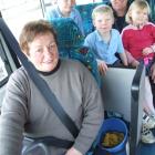 Graeme, Matthew (8), Caleb (7) and Ella (4) Taylor line up for one of Indy Gard's last bus runs....