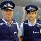 Senior Constable Paul Buchanan (left) and Constable Jude Yeoman deal with those who have earned...