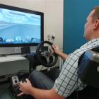 Otago Daily Times reporter Sam Stevens tries his skills on the racing car simulator at the Human...