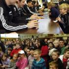 All Blacks Ali Williams and Jimmy Cowan chat with Jake Remon (5) of Dunedin 9top) during an...