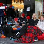 People continue to line up as Vodafone get set to start selling Apple's new iPhone 3G at one...