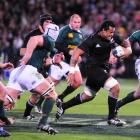 All Black replacement No 8 Sione Lauaki heads for the try line in the second half. Photo by Peter...