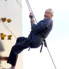 Retired Waitati man Graham Norrish (85) scales a 7.5m climbing wall in the Octagon, Dunedin,...