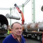 Bob Bradshaw, a former plant operator at the Dunedin City Gasworks, watches as gas-making...