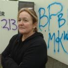 St Clair Salt Water Pool supervisor Gaye Brooks in front of some of the graffiti at the Dunedin...