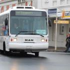 The campus circuit bus turns into George St yesterday with two passengers on board. Photo by...