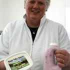 Jeanine Venecamp, of Happy Valley Dairies, holds the butter and yoghurt which have been short...