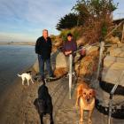 Bruce and Ruth McLean with their dogs (from left) Hope, Meg and Pip beside their recently...