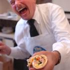 The world's fastest omelette maker, Howard Helmer (70) from the United States shows off his...