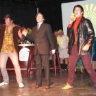 Beatle Mania '64 actors (from left) James Stephenson, Sam Farr and Mitch Martin sing New Zealand...