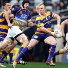 Beau Robinson of Bay of Plenty on the attack during the round one ITM Cup match between Otago and...