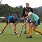 Black Sticks Hugo Inglis (left) and Blair Tarrant give Annabel Girvan (14) a few pointers at the...