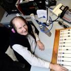 "Crackley" Rackley on the airwaves at Radio Dunedin. Photo by Gregor Richardson.