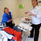 Dental therapist  and oral health promoter Robyn Hammond  (right) demonstrates tooth-brushing...